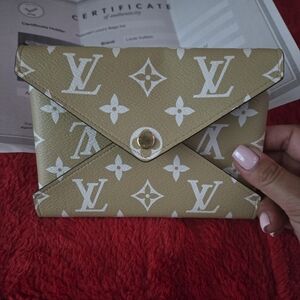 Louis Vuitton Kirigami small/medium pouch.